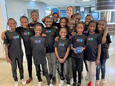 Group of Children Holding Piggy Banks