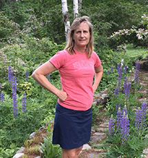 Alice Cole Standing in her Garden