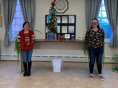 Westport Employees Wearing Holiday Sweaters