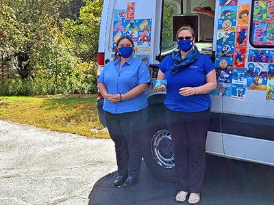 Rachel and Melanie Standing in Front of an Ice Cream Truck